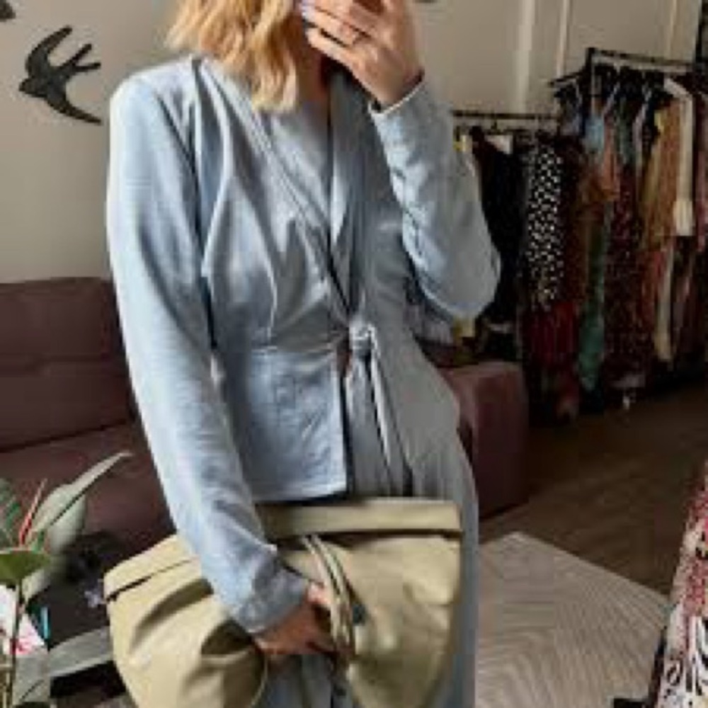 NWT Aaron and amber medium Light Blue Wrap blouse..